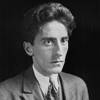 Black and white portrait photograph of Jean Cocteau c.1923