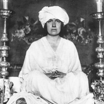 Mabel Dodge Luhan wearing turban in yoga pose, circa 1915