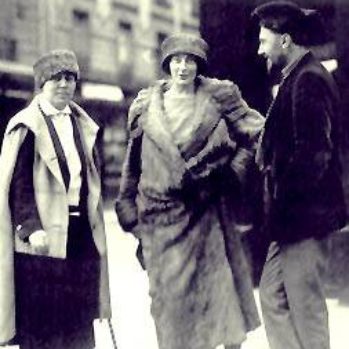 Jane Heap, Mina Loy, and Ezra Pound standing on sidewalk