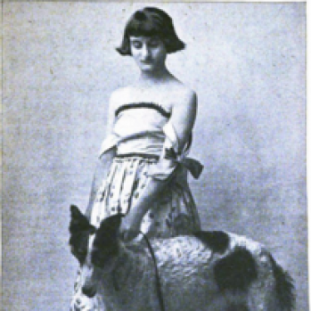 black and white portrait photograph of Clara Tice with dog