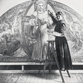 Katherine S. Dreier standing on stool with palette in from of mural at Saint Paul's School in New York