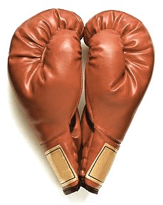 two boxing gloves arranged in heart shape