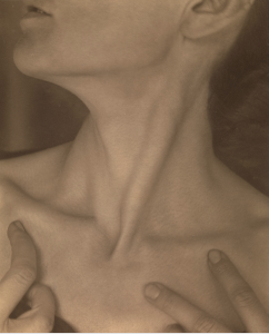 black and white photo of a woman's neck