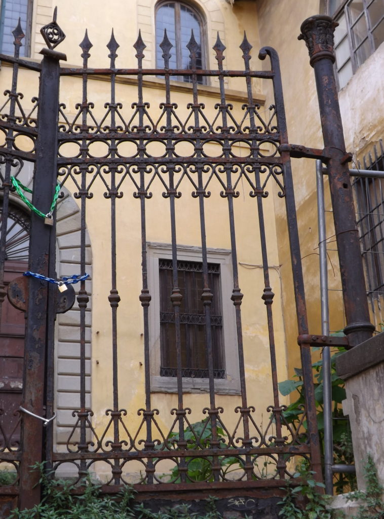 iron gate in front of building on Costa San Giorgio