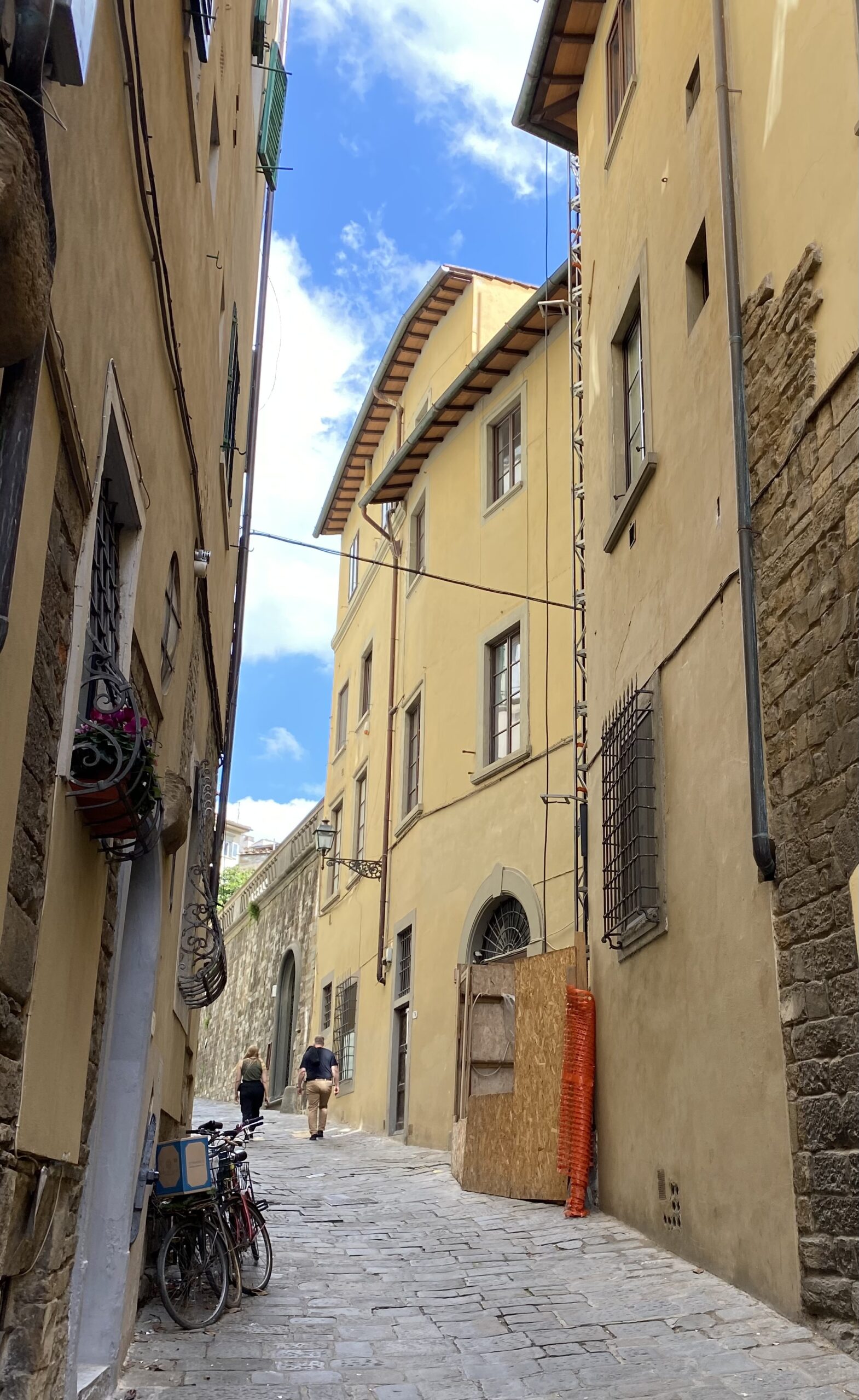 Photograph of Costa San Giorgio's cobble stones and tall, tight houses.