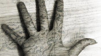 hand with map overlay