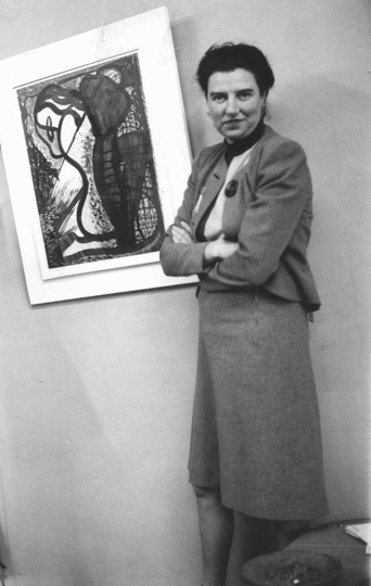 Guggenheim stands next to abstract painting.