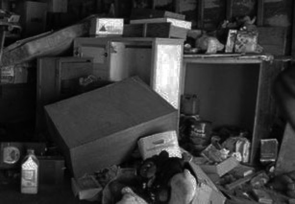 disheveled boxes and objects.
