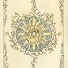 tarot card depicting eye in the middle of a sun